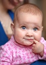 Little girl with finger in mouth Royalty Free Stock Photo