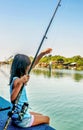 Little girl fishing on the river Bojana in Montenegro Royalty Free Stock Photo