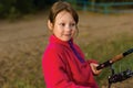 Little girl fishing with spinning Royalty Free Stock Photo