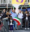 Little girl with a flag at political march