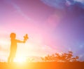 Little girl with a flower in his hand. Give someone, Silhouette