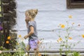 Little girl and flowers Royalty Free Stock Photo