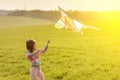 Little girl with flying kite Royalty Free Stock Photo