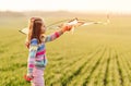 Little girl with flying kite Royalty Free Stock Photo