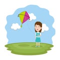 Little girl flying kite in the field Royalty Free Stock Photo