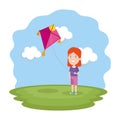 Little girl flying kite in the field Royalty Free Stock Photo