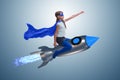 The little girl flying rocket in superhero concept Royalty Free Stock Photo