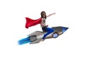 The little girl flying rocket in superhero concept Royalty Free Stock Photo