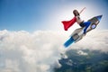 The little girl flying rocket in superhero concept Royalty Free Stock Photo