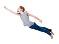 Little girl flying in the superman pose.