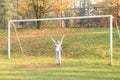 Little girl in football wicket