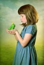 Little girl with a frog prince Royalty Free Stock Photo