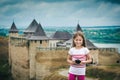 Little girl in front of Khotyn Fortress Royalty Free Stock Photo