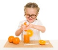 Little girl with fruits and vegetables make juice Royalty Free Stock Photo