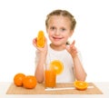 Little girl with fruits and vegetables make juice Royalty Free Stock Photo