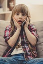 Little girl with gadget Royalty Free Stock Photo