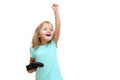 Little girl with a gamepad raised her hand up, she won