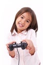 Little girl gamer playing video game