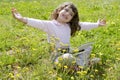 Little girl on garden meadow notebook computer Royalty Free Stock Photo