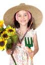 Little girl gardener with straw hat Royalty Free Stock Photo