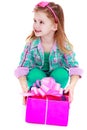 Little girl with a gift in their hands Royalty Free Stock Photo