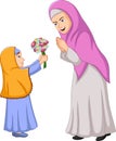 Little girl giving a bunch of flowers to her mother