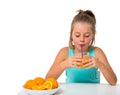 Little girl with glass of orange juice Royalty Free Stock Photo