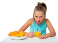 Little girl with glass of orange juice Royalty Free Stock Photo