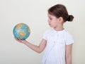 The little girl and globe.
