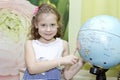 Little girl with globe Royalty Free Stock Photo