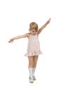 Little girl goes on tiptoe Royalty Free Stock Photo