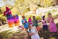 Little girl is going to broke the pinata for their birthday Royalty Free Stock Photo