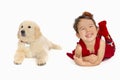 Little girl with a Golden retriever puppy isolated Royalty Free Stock Photo