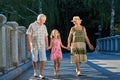 Little girl, grandfather and grandmother. Royalty Free Stock Photo