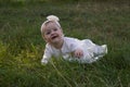 A little girl on the grass Royalty Free Stock Photo