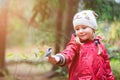 Little girl and great tit bird