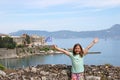 Little girl with Greek flag on summer vacation Corfu town Royalty Free Stock Photo