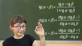 Little girl and green blackboard. Wunderkind