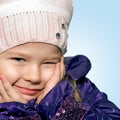 Little girl grimaces Royalty Free Stock Photo