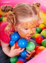 Little girl with group ball. Royalty Free Stock Photo