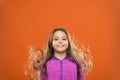 Little girl grow long hair. Teaching child healthy hair care habits. Strong hair concept. Melanin substance give pigment Royalty Free Stock Photo