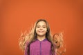 Little girl grow long hair. Teaching child healthy hair care habits. Strong hair concept. Melanin substance give pigment Royalty Free Stock Photo