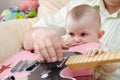 Little girl and guitar