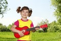 Little girl with guitar