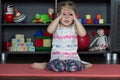 Little girl in gyan mudra yoga pose