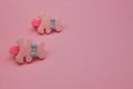 Little girl hair accessories on a pink background. Cute girlish clips for stylish hairstyles Royalty Free Stock Photo