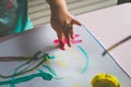 Little girl hand, who is painting with her finger Royalty Free Stock Photo