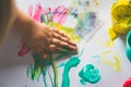 Little girl hand, who is painting with her finger Royalty Free Stock Photo