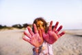 Little girl hands covered with colored powder Royalty Free Stock Photo