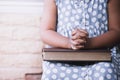 Little girl hands folded in prayer on a Holy Bible Royalty Free Stock Photo